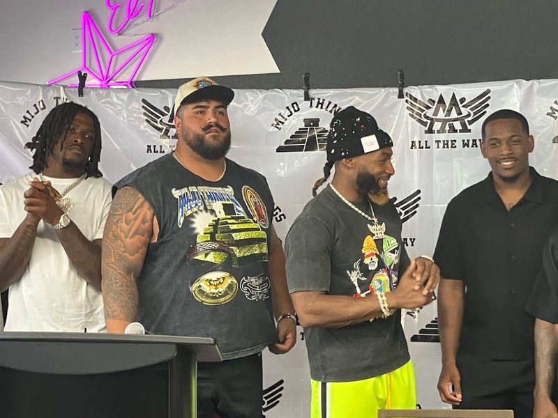 From left, Seattle Seahawks linebacker Tyrise Knight, NFL veteran guard Will Hernanez, Minnesota Vikings running back Aaron Jones and Jacksonville Jaguar end Joshua Hines-Allen promote the A&A All the Mijo Way camps at a Thursday press conference