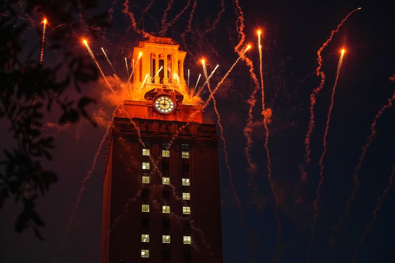 Fireworks erupt in front of the UT Tower during the SEC Celebration at the University of Texas at Austin on Sunday, June 30, 2024.