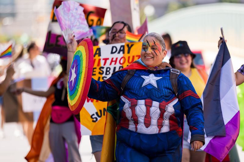 El Pasoans dress as superheroes for the “We Are the Champions, Not All Heroes Wear Capes” themed 2025 Sun City Pride Parade in Downtown El Paso on Saturday, June 21, 2025.