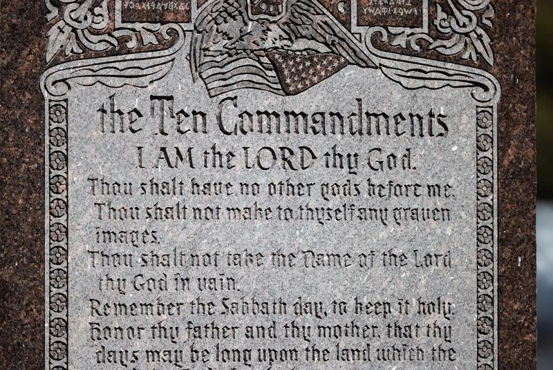 The Ten Commandments, written out on a monument, sit outside the Texas Capitol on March 17, 2025.