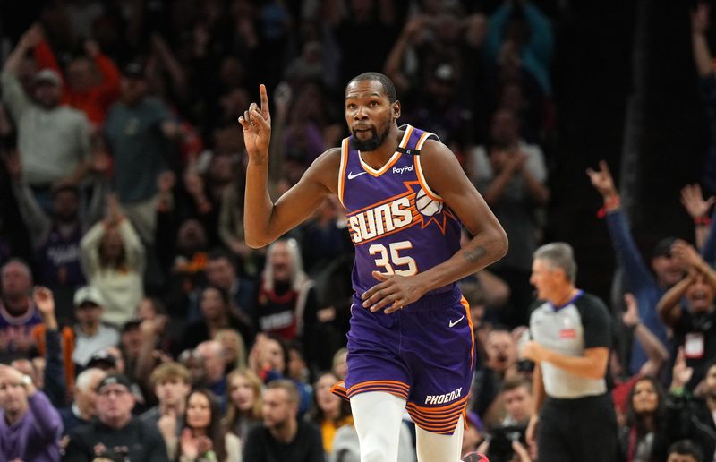 Nov 6, 2024; Phoenix, Arizona, USA; Phoenix Suns forward Kevin Durant (35) celebrates a basket against the Miami Heat during the second half at Footprint Center. Mandatory Credit: Joe Camporeale-Imagn Images