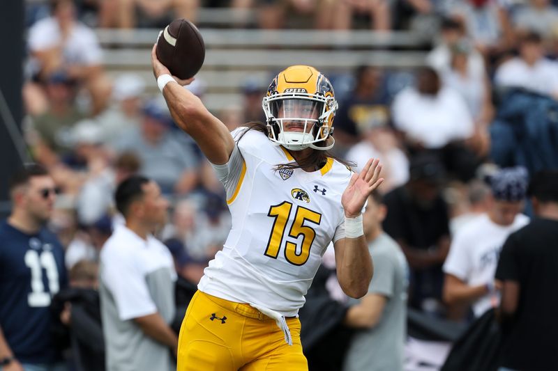 Sep 21, 2024; University Park, Pennsylvania, USA; Kent State Golden Flashes quarterback Devin Kargman (15) throws a pass during a warmup prior to the game against the Penn State Nittany Lions at Beaver Stadium. Mandatory Credit: Matthew O'Haren-Imagn Images