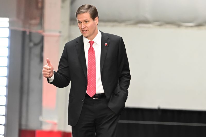 Nov 28, 2022; Omaha, Nebraska, US; Nebraska Cornhuskers athletic director Trev Alberts signals to the press at the Hawks Championship Center on the University of Nebraska-Lincoln campus. Mandatory Credit: Steven Branscombe-USA TODAY Sports