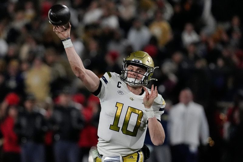 Georgia Tech quarterback Haynes King (10) throws a pass during the first half of a NCAA college football game against Georgia Tech in Athens, Ga., on Friday, Nov. 29, 2024.