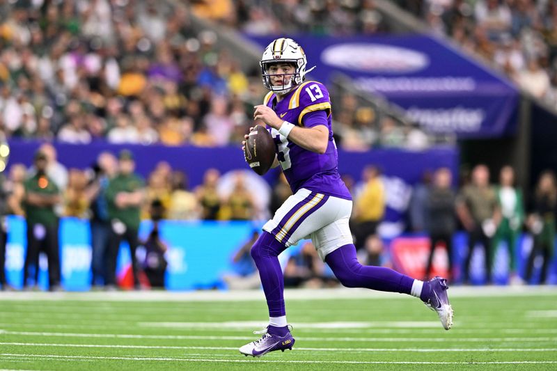 Dec 31, 2024; Houston, TX, USA; LSU Tigers quarterback Garrett Nussmeier (13) runs the ball during the first half against the Baylor Bears at NRG Stadium. Mandatory Credit: Maria Lysaker-Imagn Images