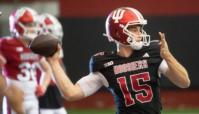 Indiana's Fernando Mendoza (15) throws a pass during spring football practice on Tuesday, April 8, 2025.