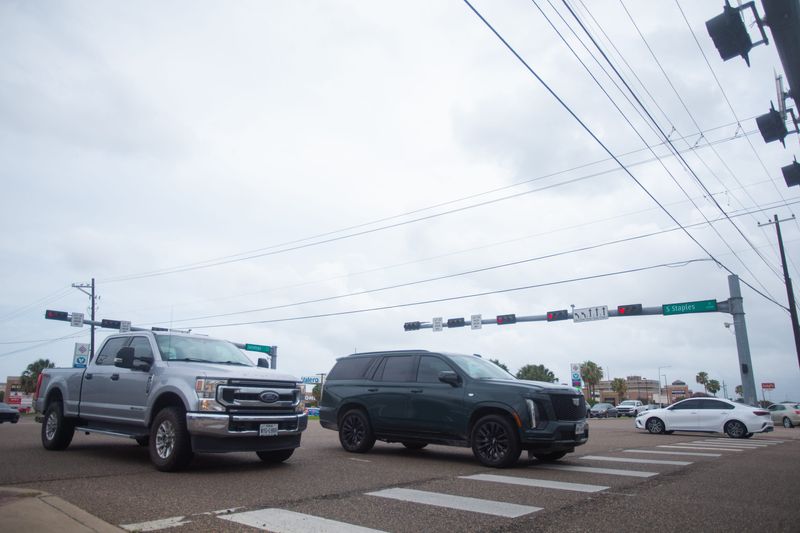 Traffic flows at the intersection of South Staples Street and Saratoga Boulevard in Corpus Christi on July 1.