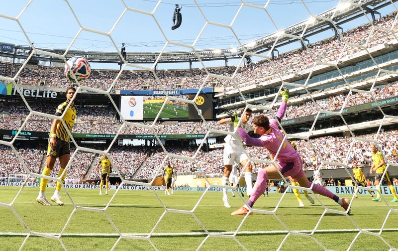 July 5: Real Madrid's Gonzalo Garcia (30) scores his team's first goal against Borussia Dortmund during a quarterfinal match at MetLife Stadium.