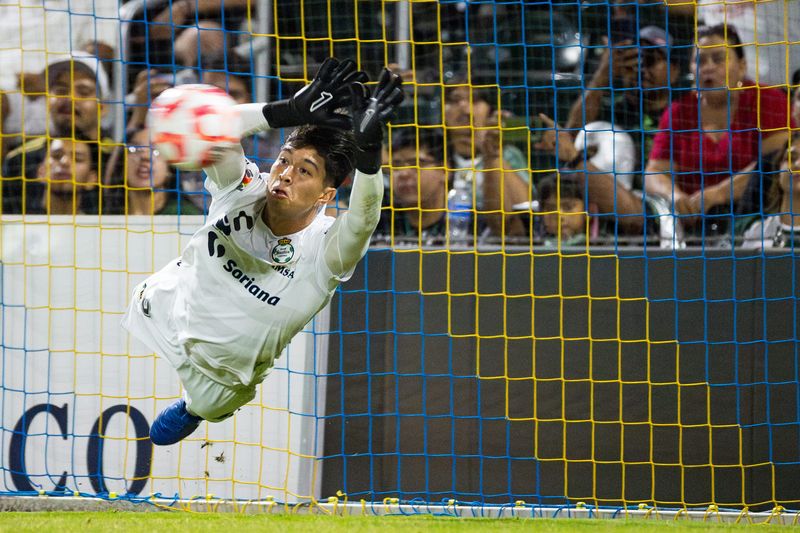 Santos Laguna goalkeeper Héctor Holguín (33) blocks a shot, helping secure their 5-3 win on penalty kicks against FC Juárez in a friendly match at Southwest University Park on July 5, 2025.