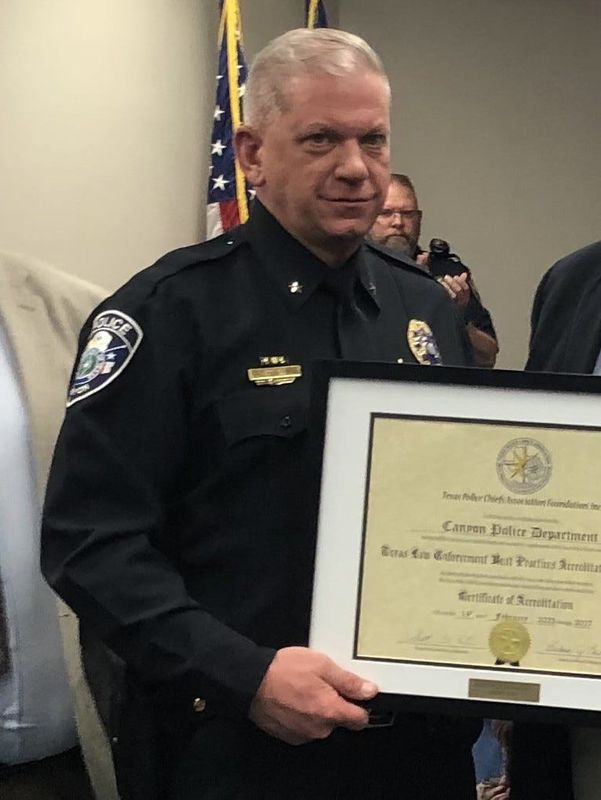 Canyon Chief of Police Steve Brush, in an earlier photo, is shown with an accreditation from Texas Police Chiefs Association making Canyon Police Department the first agency in the history of the program to receive a fifth accreditation in 2023.