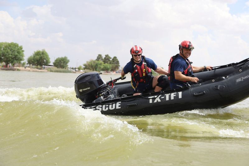 The El Paso Fire Department Water Rescue Team is taking part in rescue efforts after the devastating flooding in central Texas on July 4, 2025. Team members ride a boat during a training session in Ascarate Lake in El Paso earlier in 2025 in this photo.