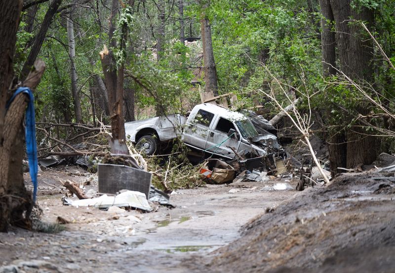 Survivor Rod Downing's pickup truck was crushed by flood waters at the Riverview RV Park in Ruidoso, New Mexico on July 9, 2025.