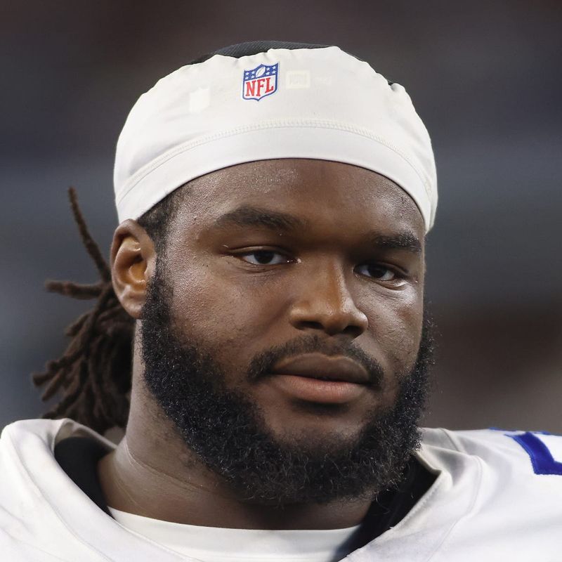 Aug 26, 2023; Arlington, Texas, USA; Dallas Cowboys defensive tackle Mazi Smith (58) on the sidelines during the game against the Las Vegas Raiders at AT&T Stadium. Mandatory Credit: Tim Heitman-USA TODAY Sports