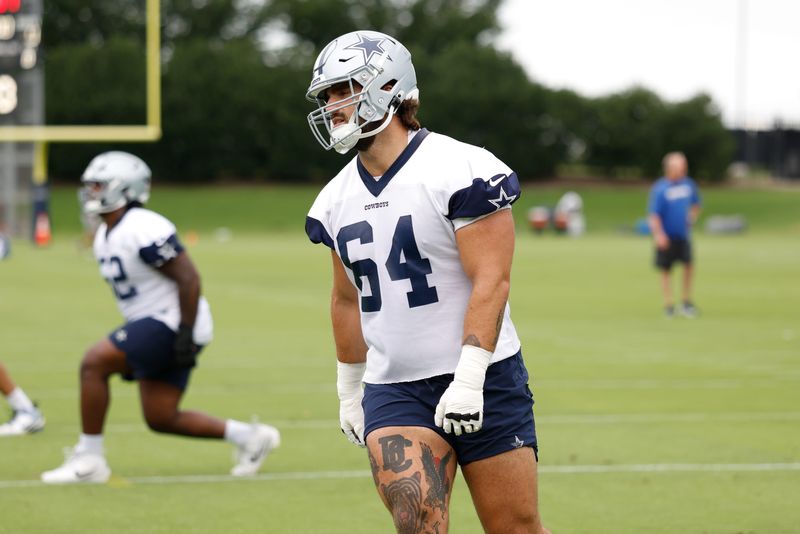 Jun 10, 2025; Arlington, TX, USA; Dallas Cowboys offensive tackle Dakoda Shepley (64) goes through a drill during practice at the Ford Center at the Star Training Facility in Frisco, Texas. Mandatory Credit: Chris Jones-Imagn Images