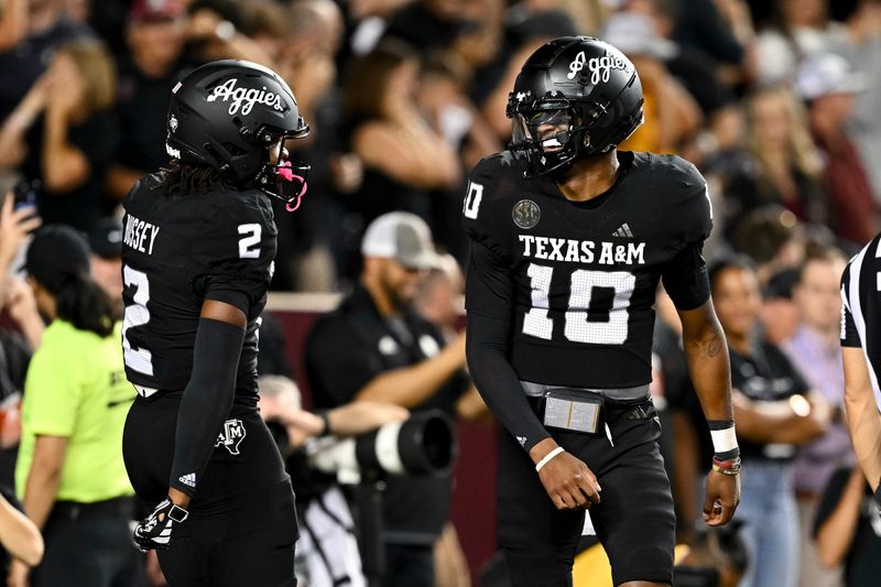Oct 26, 2024; College Station, Texas, USA; Texas A&M Aggies quarterback Marcel Reed (10) celebrates after scoring a touchdown in the fourth quarter against the LSU Tigers at Kyle Field. Mandatory Credit: Maria Lysaker-Imagn Images.