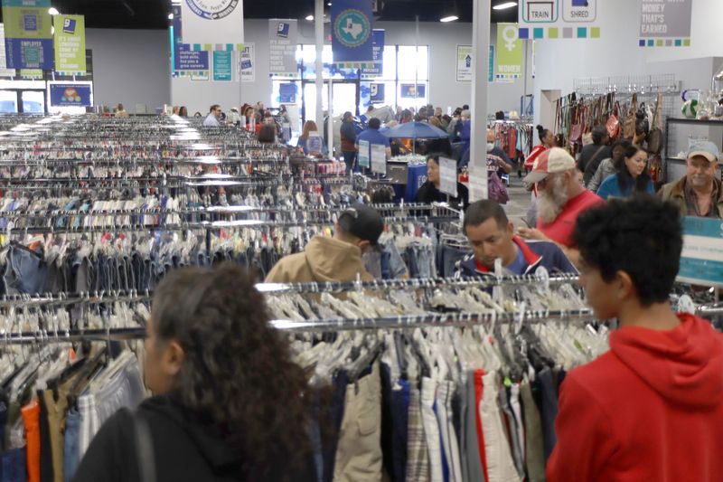 In this 2021 file photo, customers browse through racks of clothing and other items on sale at Goodwill's second location in Amarillo next to United at 45th and Bell.