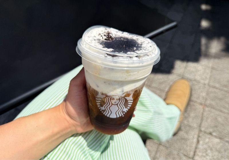 Starbucks Cold Brew with vanilla syrup, vanilla sweet cream cold foam and cookie crumbles.