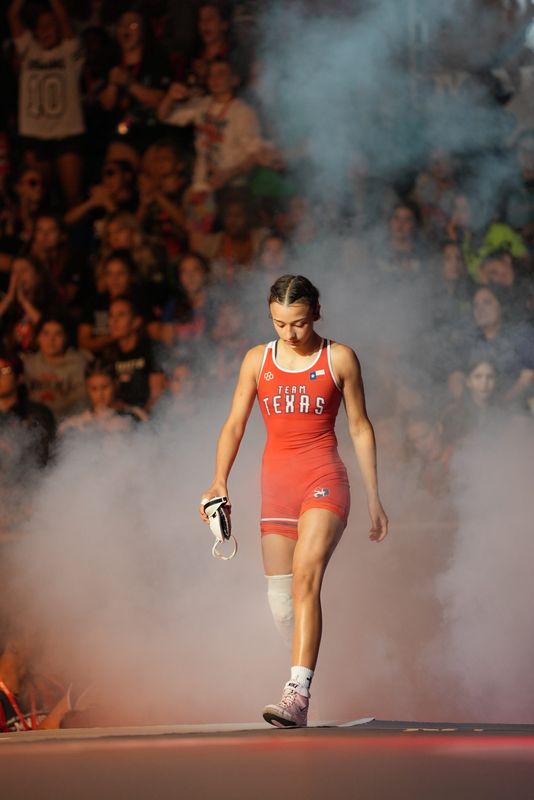 Hailey Delgado claims the championship medal for the 105-pound division at the U16 U.S. Marine Corps Junior Nationals