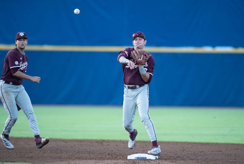 Texas A&M Aggies' Ben Royo (10) throws the ball to first base as LSU Tigers take on Texas A&M Aggies during the SEC baseball tournament at Hoover Met in Birmingham, Ala., on Friday, May 23, 2025.