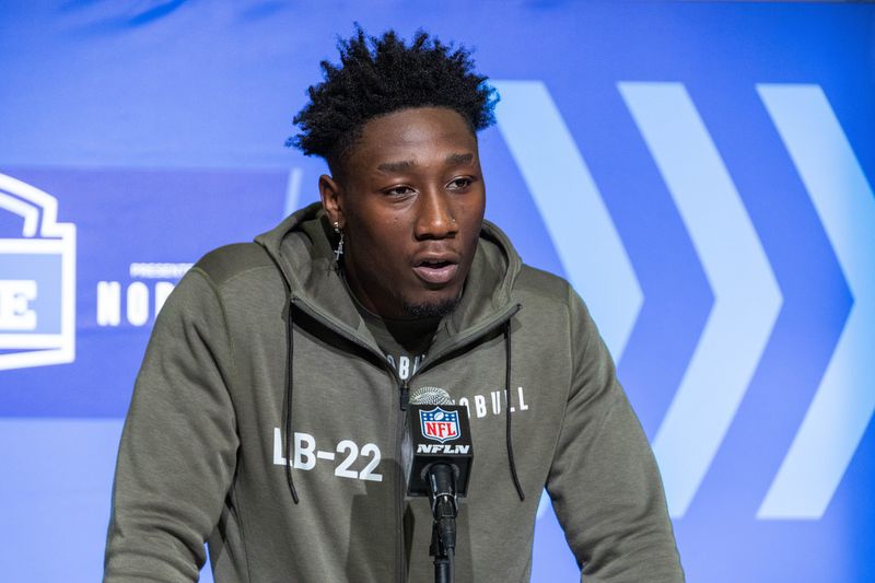 Mar 1, 2023; Indianapolis, IN, USA; Texas linebacker Demarvion Overshown (LB22) speaks to the press at the NFL Combine at Lucas Oil Stadium. Mandatory Credit: Trevor Ruszkowski-USA TODAY Sports