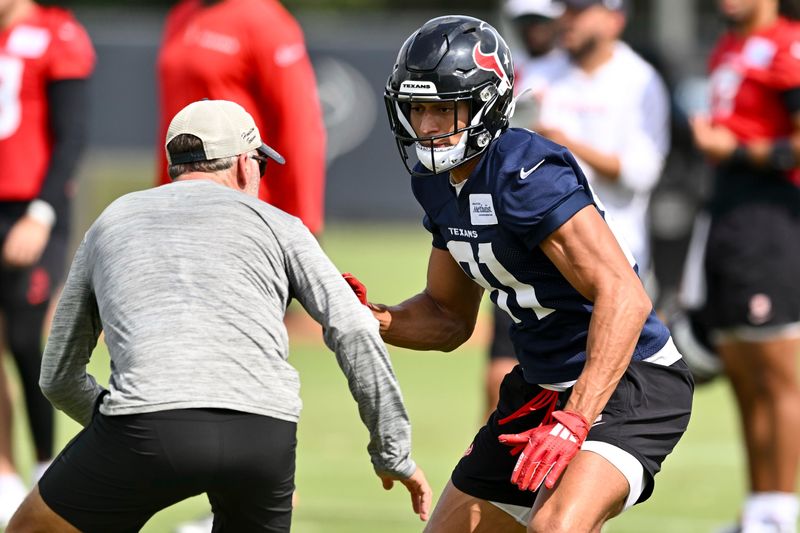 Jun 10, 2025; Houston, TX, USA; Houston Texans wide receiver Jayden Higgins (81) participates in a drill during an NFL football minicamp at NRG Stadium. Mandatory Credit: Maria Lysaker-Imagn Images