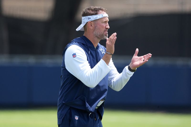 Jul 22, 2025; Oxnard, CA, USA; Dallas Cowboys coach Brian Schottenheimer during training camp at the River Ridge Fields. Mandatory Credit: Kirby Lee-Imagn Images