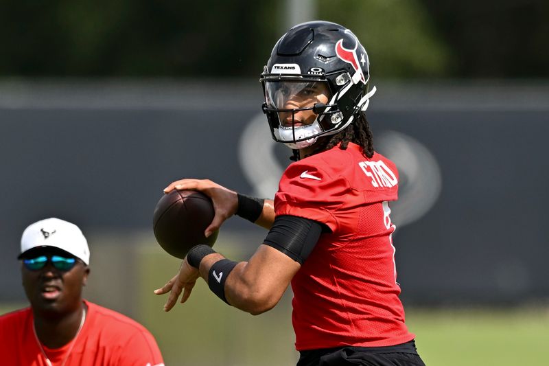 Jun 10, 2025; Houston, TX, USA; Houston Texans quarterback C.J. Stroud (7) participates in a drill during an NFL football minicamp at NRG Stadium. Mandatory Credit: Maria Lysaker-Imagn Images