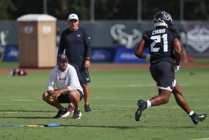 Jul 24, 2025; Houston, TX, USA; Houston Texans offensive coordinator Nick Caley watches during training camp at Houston Methodist Training Center. Mandatory Credit: Troy Taormina-Imagn Images