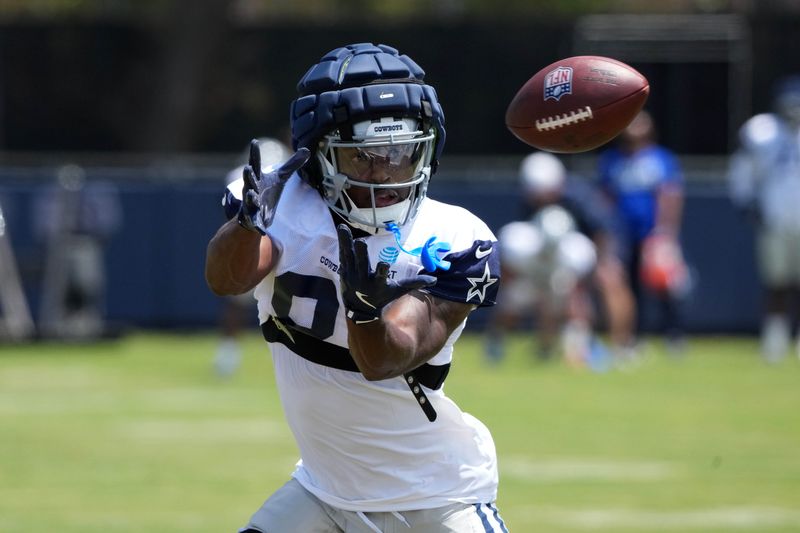Jul 27, 2025; Oxnard, CA, USA; Dallas Cowboys wide receiver Jonathan Mingo (81) catches the ball at training camp at the River Ridge Fields. Mandatory Credit: Kirby Lee-Imagn Images