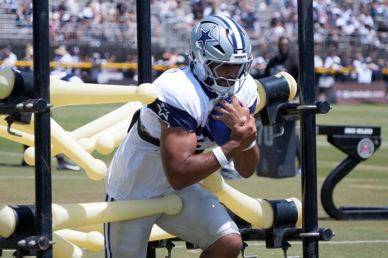 Jul 27, 2025; Oxnard, CA, USA; Dallas Cowboys tight end Brevyn Spann-Ford (89) carries the ball at training camp at the River Ridge Fields. Mandatory Credit: Kirby Lee-Imagn Images