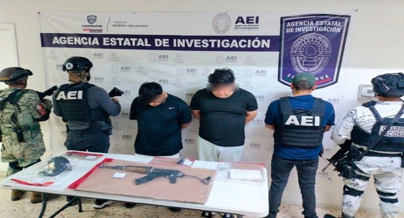 Two of six alleged members of Los Cabrera, a faction of the Sinaloa drug cartel in Chihuahua state, are displayed following their arrest in a special operation by Chihuahua state police and the Mexican military in the Chihuahua City region on July 27, 2025.