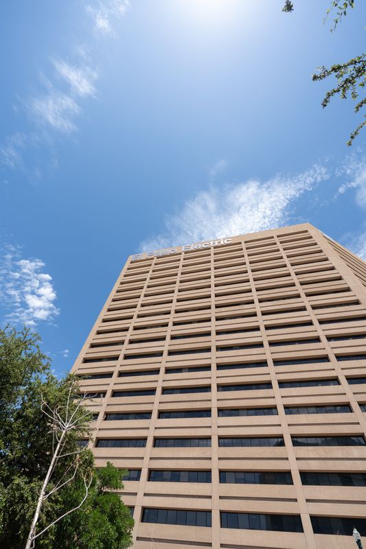 Members of the community and Sembrando Esperanza Coalition meet near the El Paso Electricity building to discuss the rising electricity prices in El Paso, Texas in the Aztec Calendar Park at noon on July 30, 2025.