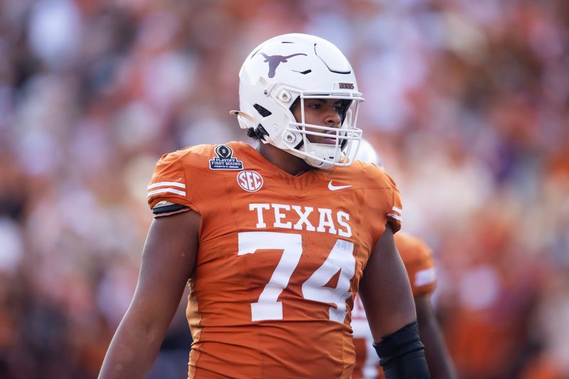 Dec 21, 2024; Austin, Texas, USA; Texas Longhorns offensive lineman Trevor Goosby (74) against the Clemson Tigers during the CFP National playoff first round at Darrell K Royal-Texas Memorial Stadium. Mandatory Credit: Mark J. Rebilas-Imagn Images
