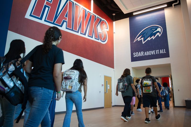 Students enter Hamlin Middle School in Corpus Christi, Texas, on Aug. 11, 2025.