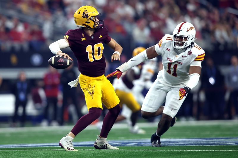 Dec 7, 2024; Arlington, TX, USA; Arizona State Sun Devils quarterback Sam Leavitt (10) throws a pass against Iowa State Cyclones defensive end Tyler Onyedim (11) in the second quarter at AT&T Stadium. Mandatory Credit: Tim Heitman-Imagn Images