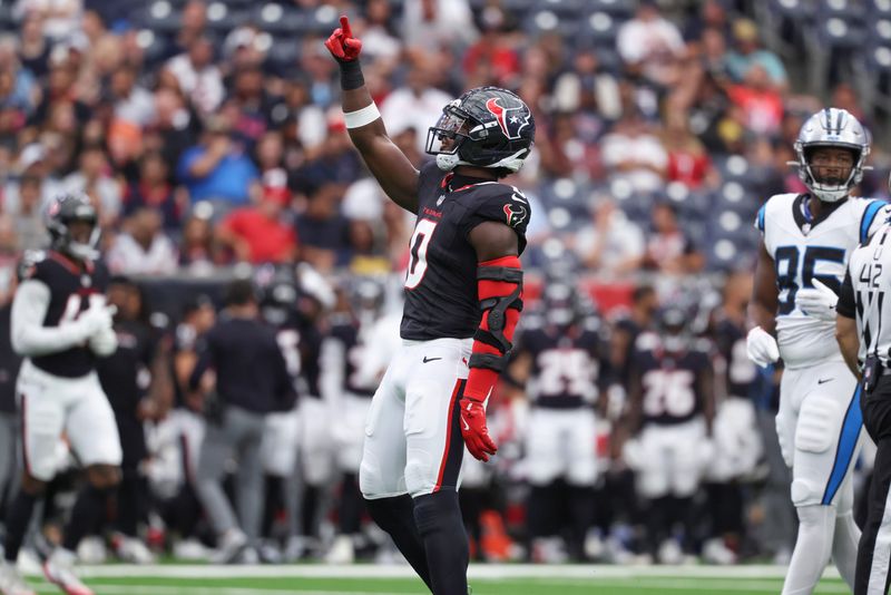 Aug 16, 2025; Houston, Texas, USA; Houston Texans linebacker Azeez Al-Shaair (0) reacts after a defensive play during the first quarter against the Carolina Panthers at NRG Stadium. Mandatory Credit: Troy Taormina-Imagn Images