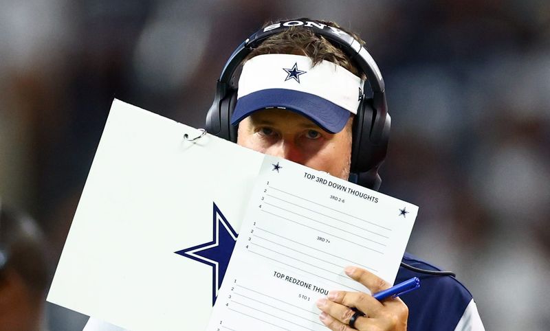 Aug 16, 2025; Arlington, Texas, USA; Dallas Cowboys head coach Brian Schottenheimer during the second half against the Baltimore Ravens at AT&T Stadium. Mandatory Credit: Kevin Jairaj-Imagn Images