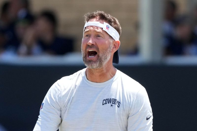 Jul 27, 2025; Oxnard, CA, USA; Dallas Cowboys coach Brian Schottenheimer at training camp at the River Ridge Fields. Mandatory Credit: Kirby Lee-Imagn Images