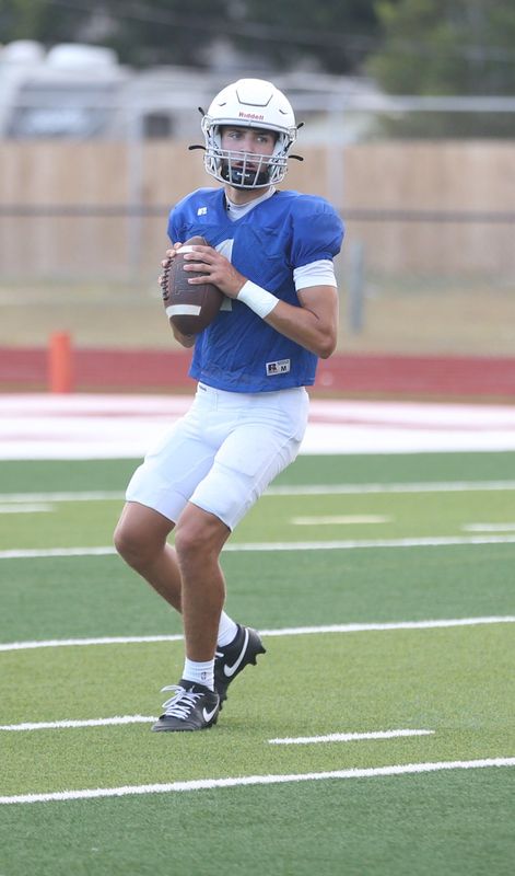 Flour Bluff quarterback Lucian Cruz drops back to pass during a scrimmage against Jourdanton on Thursday, Aug. 21, 2025 at Hornet Stadium.