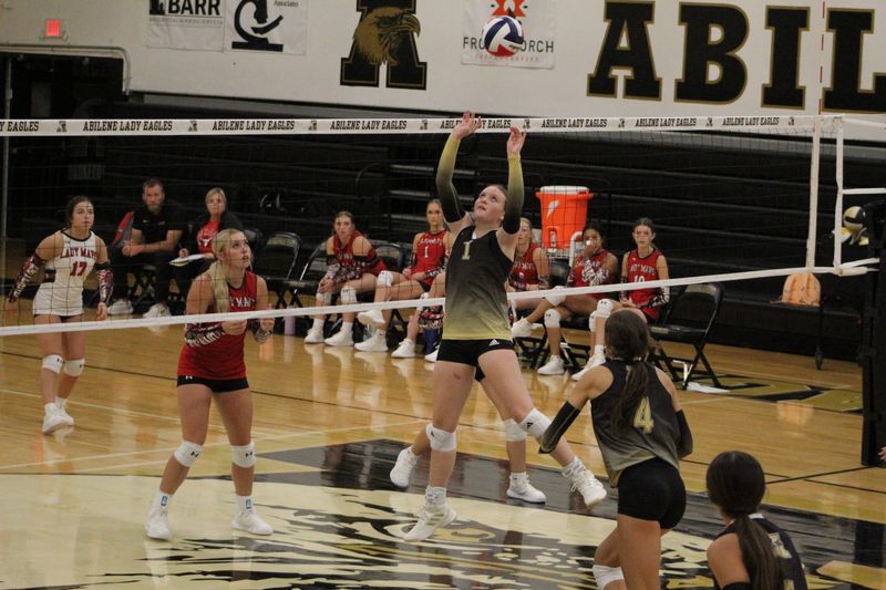 The Abilene High Lady Eagles and the Eastland Mavericks battle during Day 1 of the 2025 Bev Ball Classic high school volleyball tournament at Abilene High School. Abilene High won the match 2-0.