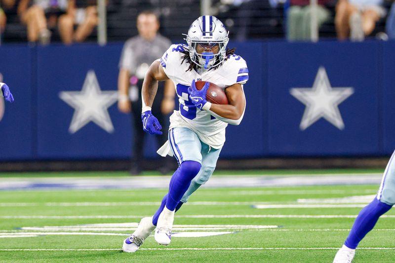 Aug 22, 2025; Arlington, Texas, USA; Dallas Cowboys running back Jaydon Blue (34) carries the ball during the fourth quarter against the Atlanta Falcons at AT&T Stadium. Mandatory Credit: Andrew Dieb-Imagn Images