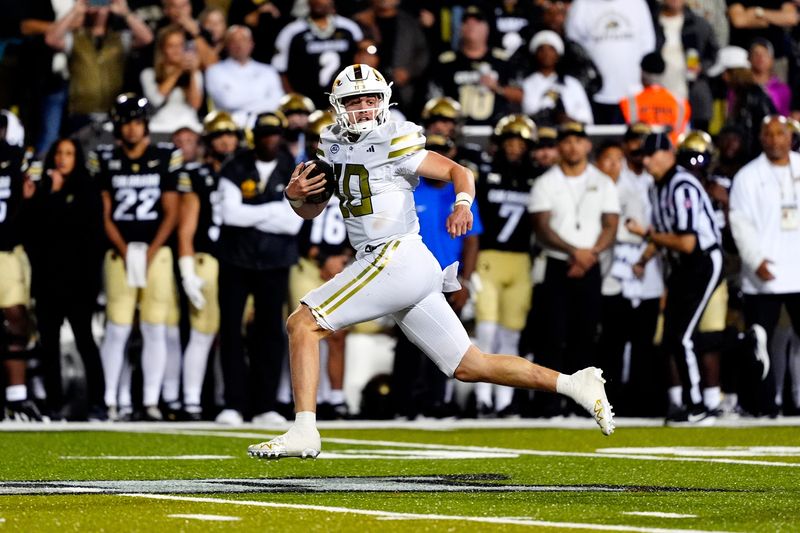 Aug 29, 2025; Boulder, Colorado, USA; Georgia Tech Yellow Jackets quarterback Haynes King (10) runs for a touchdown in the fourth quarter against the Colorado Buffaloes at Folsom Field. Mandatory Credit: Ron Chenoy-Imagn Images