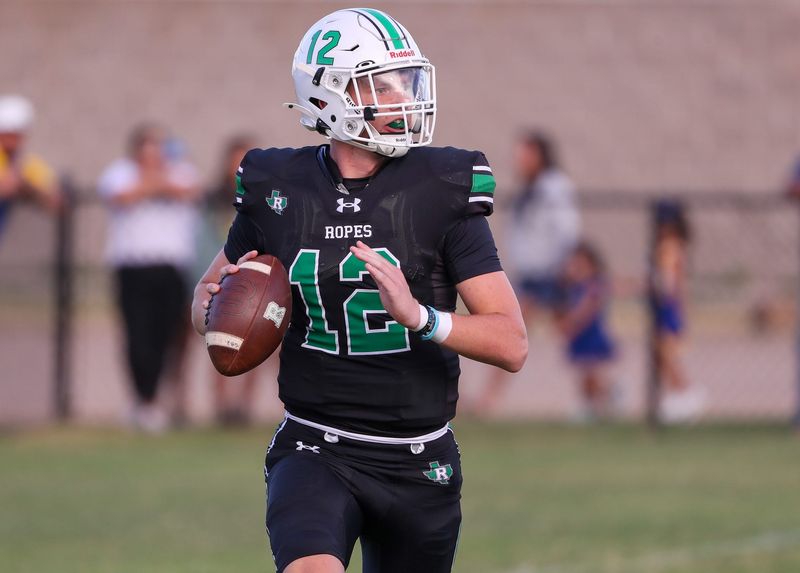 Ropes' Kade Franklin looks to pass against Hale Center during a non-district football game, Friday, August 29, 2025, at Eagle Stadium in Ropesville.