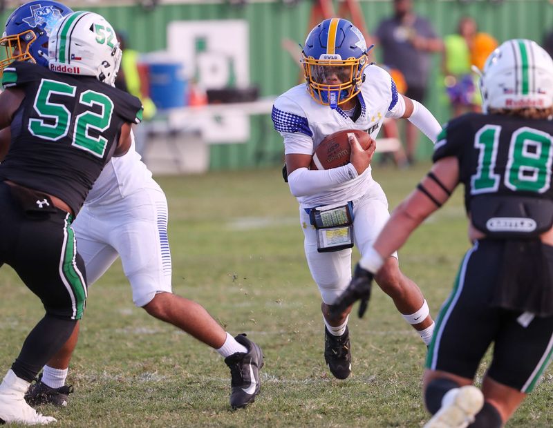 Hale Center's Martin Cano runs with the ball against Ropes during a non-district football game, Friday, August 29, 2025, at Eagle Stadium in Ropesville.