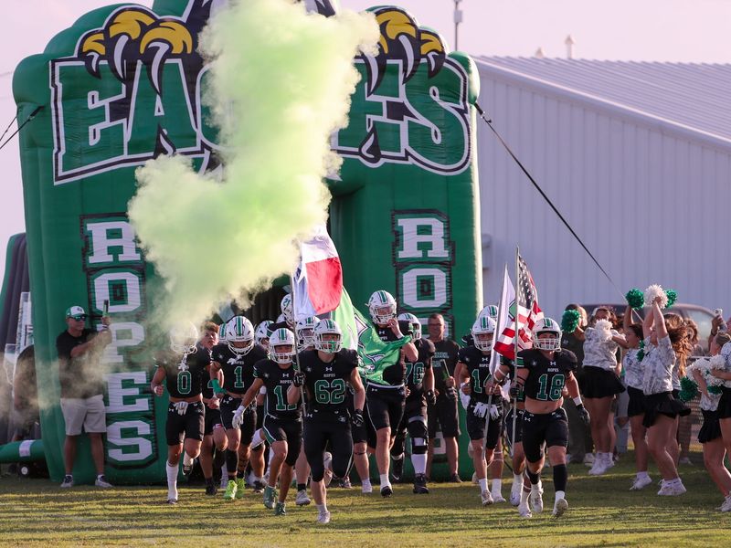 Ropes runs out to the field before a non-district football game, Friday, August 29, 2025, at Eagle Stadium in Ropesville.