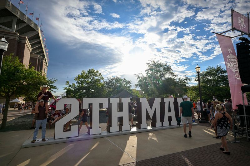Sep 17, 2022; College Station, Texas, USA; A view of the fans posing for a photo with the 12th Man logo before the game between the Texas A&M Aggies and the Miami Hurricanes at Kyle Field. Mandatory Credit: Jerome Miron-USA TODAY Sports