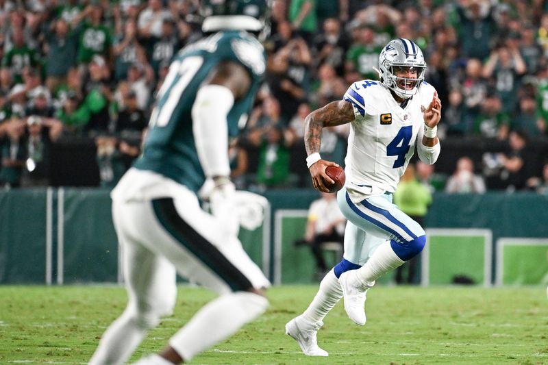 Sep 4, 2025; Philadelphia, Pennsylvania, USA; Dallas Cowboys quarterback Dak Prescott (4) carries the ball against the Philadelphia Eagles during the second quarter of the game at Lincoln Financial Field. Mandatory Credit: Eric Hartline-Imagn Images