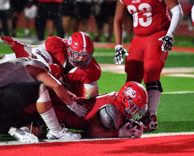Holliday's Cash Kirkland scores a touchdown during a game against Muenster on Friday, Sep. 5, 2025 in Holliday.