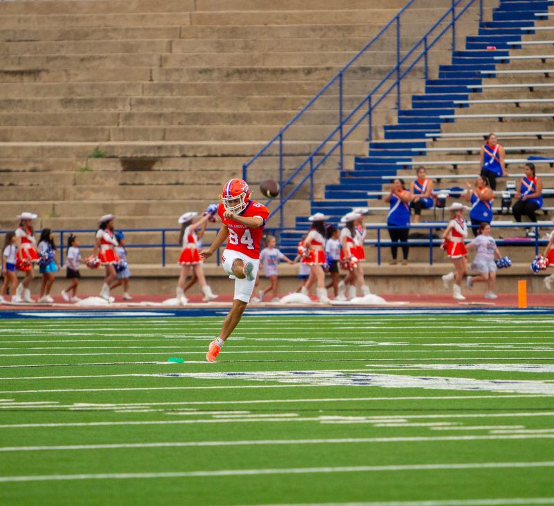 San Angelo Central football's Caleb Holbert (84) kicks the opening kick off against Amarillo High at San Angelo Stadium on Friday, Sept. 5, 2025.