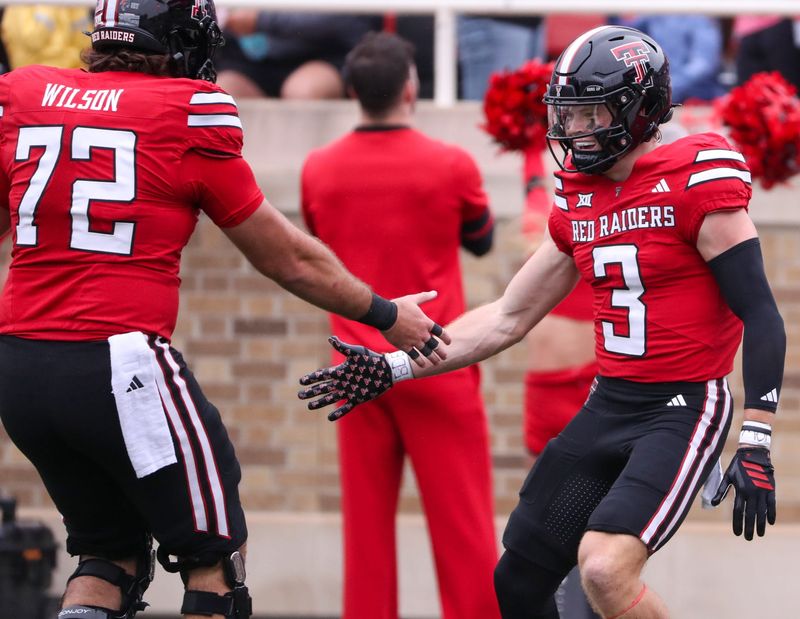 Texas Tech's Coy Eakin celebrates his touchdown with Sheridan Wilson against Kent State during a non-conference football game, Saturday, September 6, 2025, at Jones AT&T Stadium.